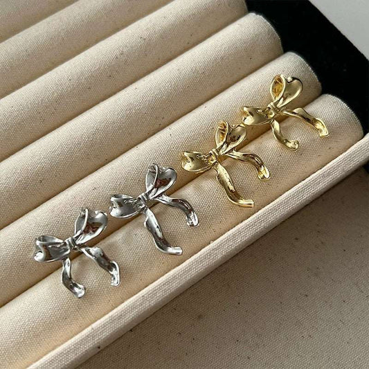 Design sweet and cool style bow knot earrings - women's simple, elegant jewelry.