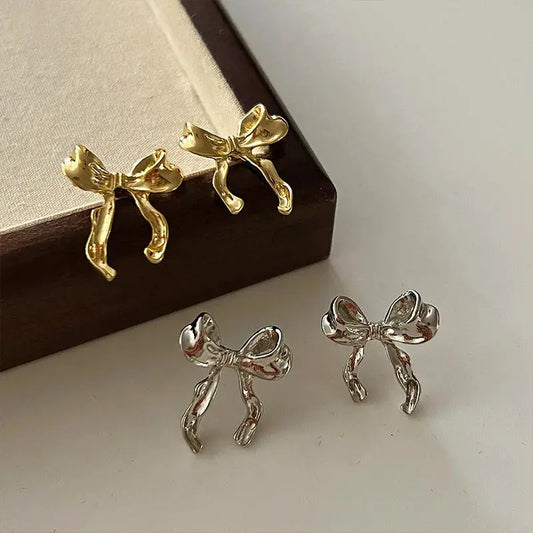 Design sweet and cool style bow knot earrings - women's simple, elegant jewelry.